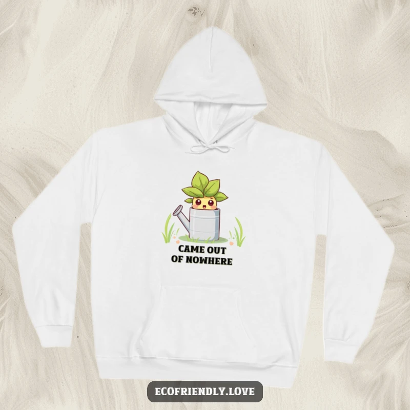 Funny hoodie showcasing a wide-eyed sprout character emerging from a watering can, offering cozy comfort and lighthearted fun.