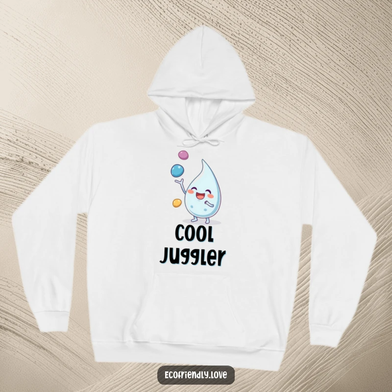 Funny hoodie featuring a happy water droplet character juggling pebbles, offering cozy cheer and playful energy.