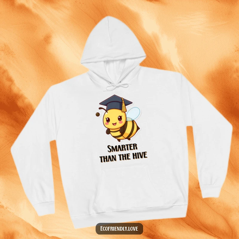 Funny kawaii bee in a graduation cap, buzzing happily on a cozy hoodie, a perfect humorous present.