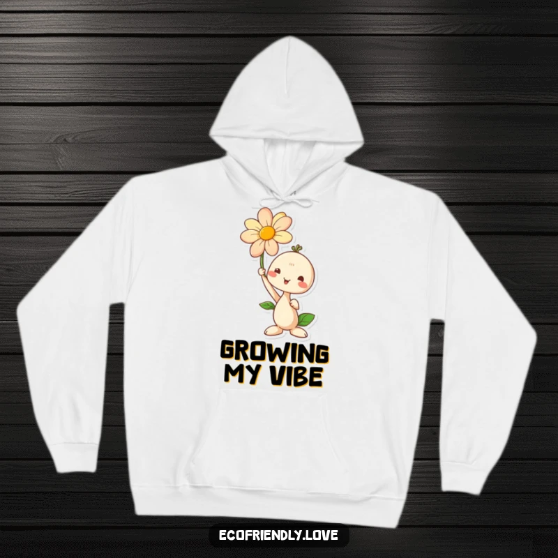 Funny hoodie featuring a cute seedling character proudly holding a blooming flower, offering warmth and symbolizing personal development.