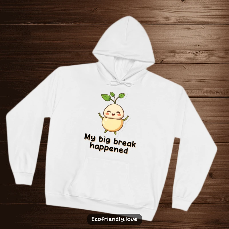 Funny hoodie featuring a smiling seed character explosively sprouting, symbolizing a happy and humorous start to life.