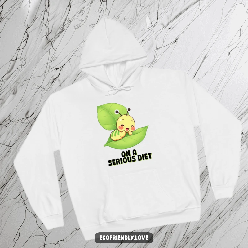 Funny Caterpillar Hoodie depicting a giddy character happily munching away on a large green leaf, perfect for relaxation.