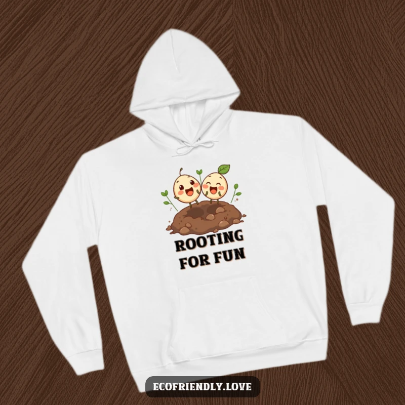 Funny hoodie featuring two round, giggling seeds bouncing excitedly in an open soil patch, offering cozy humor and garden cheer.