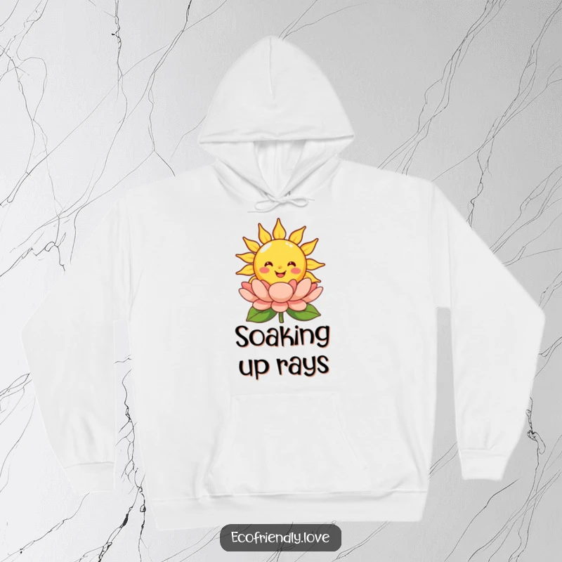 Funny smiling sun hoodie with a happy cartoon sun character radiating warmth upon a colorful blooming flower, providing cozy comfort.