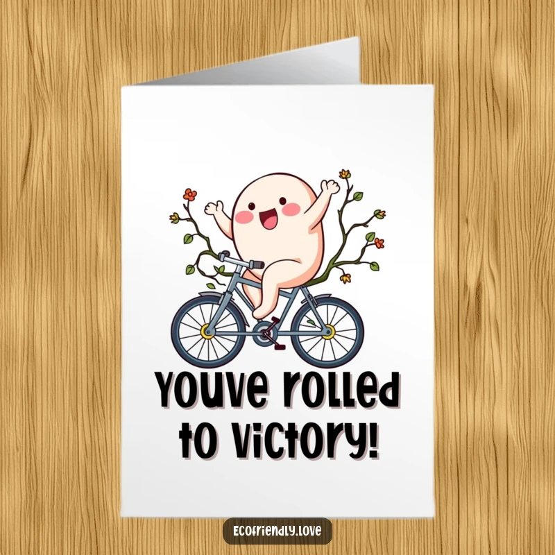 Funny Free Printable Congratulations Card: Blob character joyfully cycling on a vine bike, symbolizing a triumphant journey.