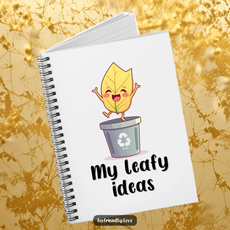 Funny leaf notebook showing a cheerful leaf character joyfully leaping over a recycling bin, a funny gift.