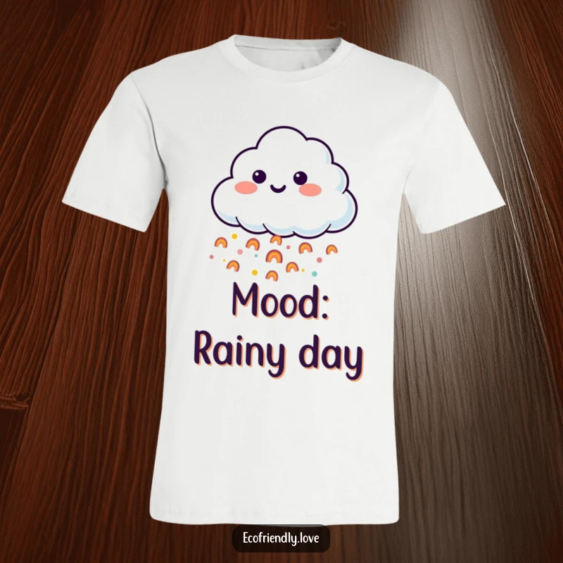 Funny t-shirt featuring a smiling cloud character releasing a stream of tiny, happy rainbows in a gentle, colorful downpour.