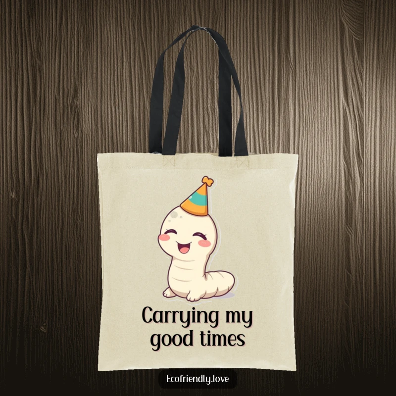 Funny kawaii worm giggling with a party hat on a tote bag, a humorous and practical accessory.